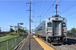 Westbound NJ Transit Train # 3861, being led by Comet V Cab Car # 6015 